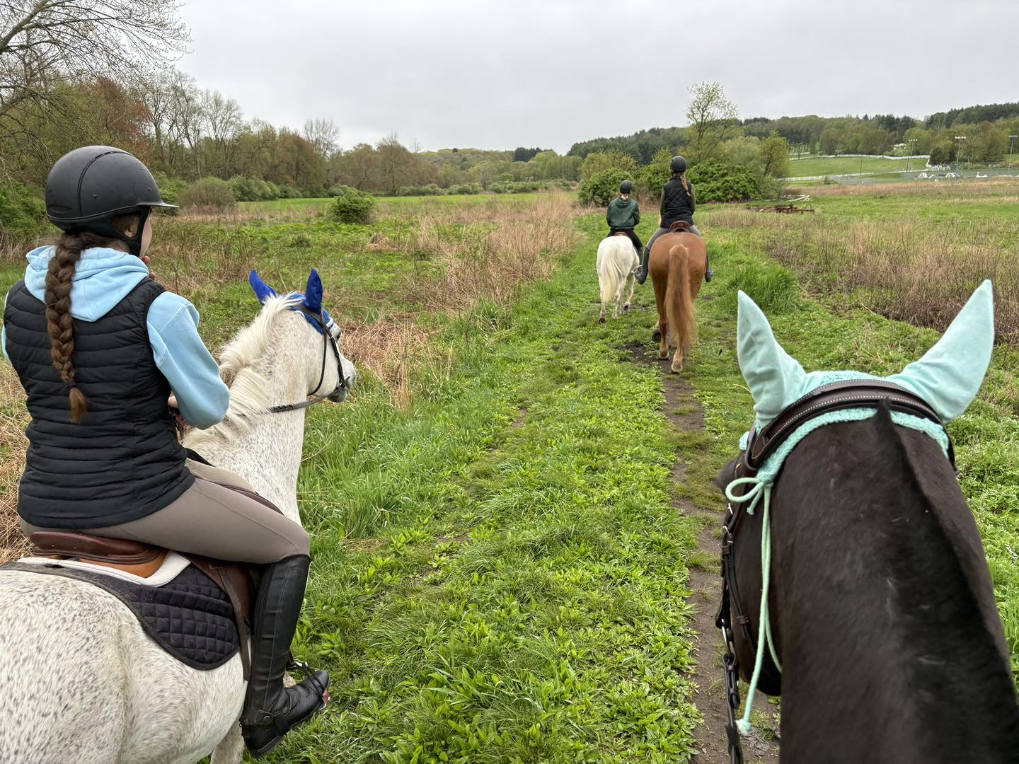 Riders exploring a countryside trail